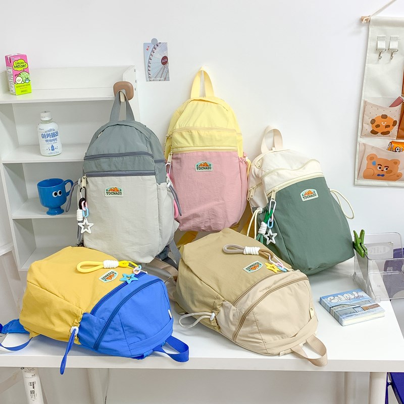 Mochila de estilo coreano para niños y niñas, mochila de estilo extranjero de gran capacidad para estudiantes de escuela primaria 2025 nueva mochila infantil