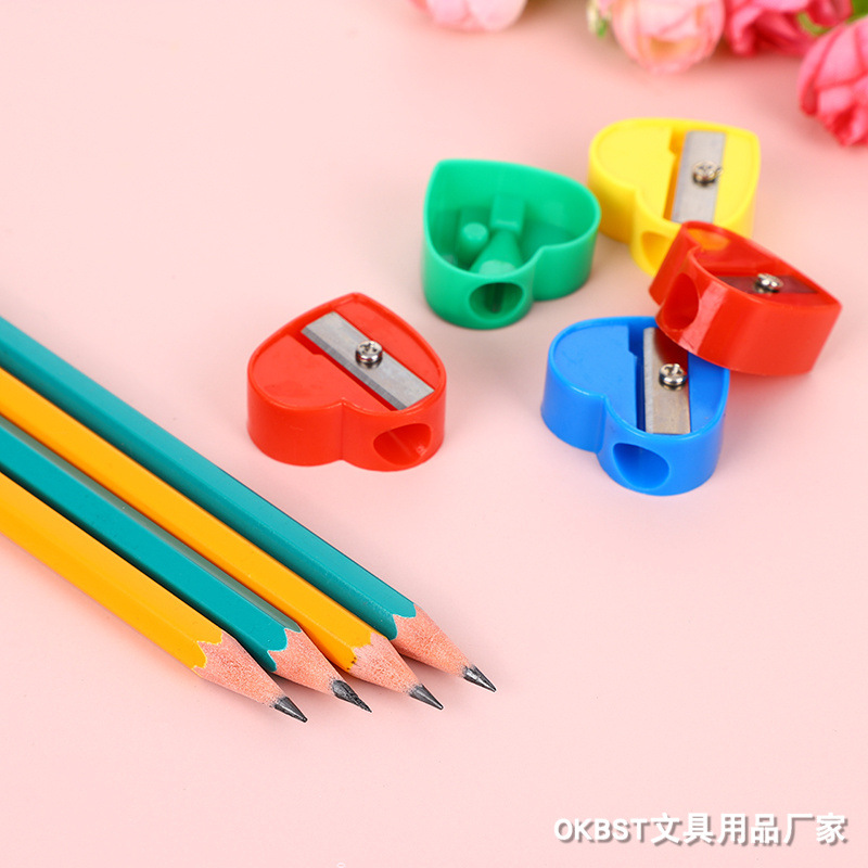 Sacapuntas de lápiz de un solo agujero en forma de corazón Sacapuntas de dibujos animados mini Sacapuntas de lápiz estudiante de la escuela primaria suministros de papelería ventas directas de fábrica