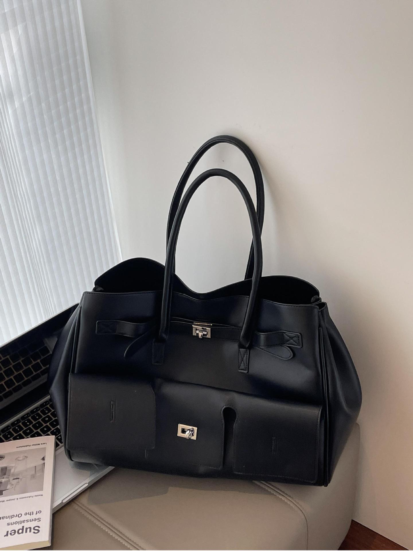 Bolso de viaje portátil retro explosivo transfronterizo 2025 nuevo maletín casual versátil bolso de alta gama de un solo hombro