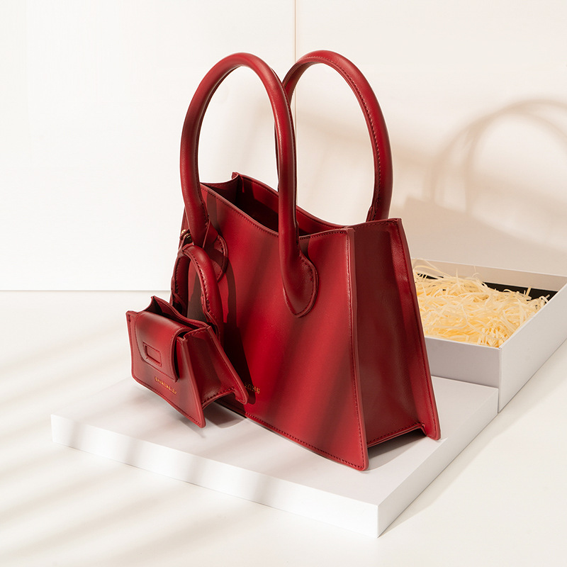[Two Innocent] Bolso de mano rojo para boda, bolso de gama alta, bolso cruzado para mujer, para ir al trabajo, 2025
