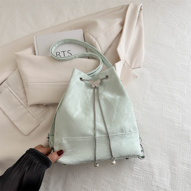 Butterfly texture bolso para mujeres 2024 verano nuevo hombro brazo bolso de cubo bolso de diseño sensación de mochila de viaje