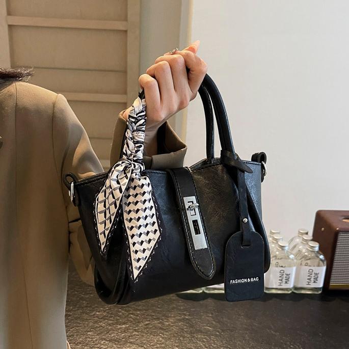 Bolso de mano universal de alta sensación para mujeres 2024 nuevo popular bolso de cubo de agua super caliente nicho de moda retro mochila