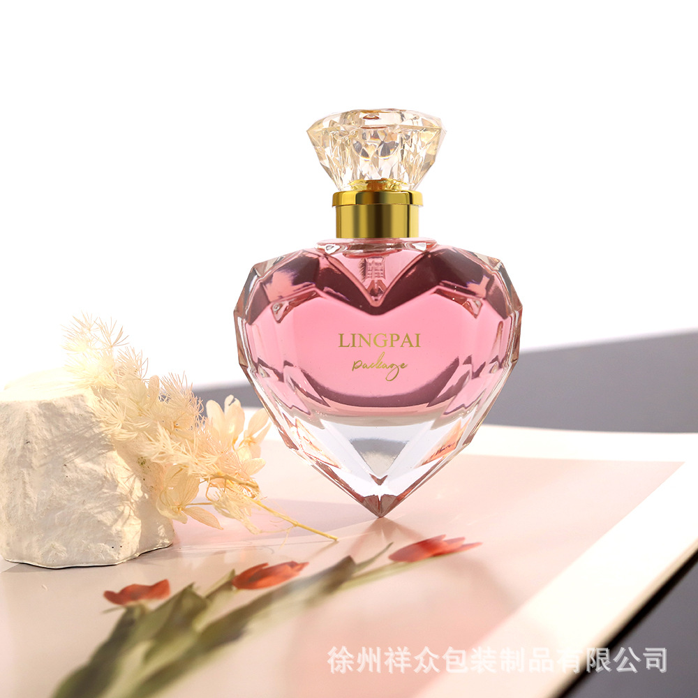 Botella vacía de vidrio de perfume específica de amor transparente con tapa de aspersor y botella de perfume de pulverización portátil