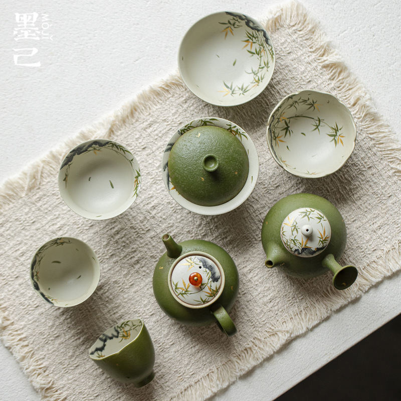 Hand-Painted Antique-Style Tea Set Collection with Small Green Mandarin, Golden Bamboo, and Wind-Themed Designs, Including a Teapot, Gaiwan, Teacups, and Master Cups for Home Use Hand-Painted Antique-Style Tea Set Collection with Small Green Mandarin, Golden Bamboo, and Wind-Themed Designs, Including a Teapot, Gaiwan, Teacups, and Master Cups for Home Use