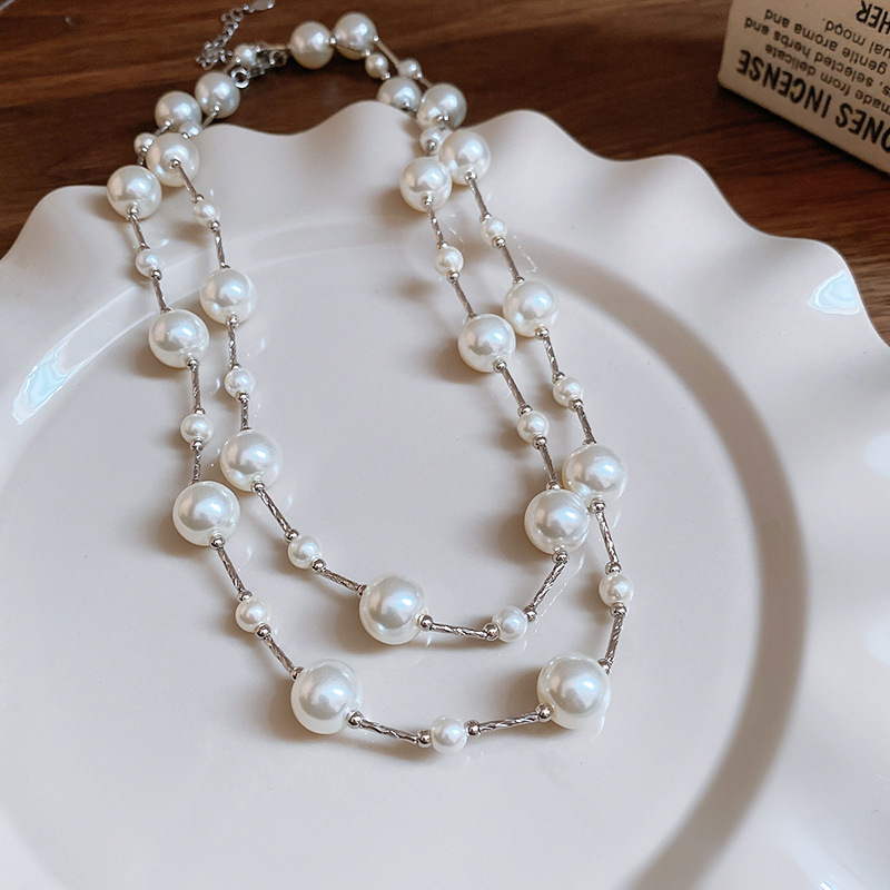 Collar con cuentas de perlas de gota de agua con diamantes transfronterizos otoño e invierno cadena de suéter de lujo ligero francés moda todo fósforo joyería de alta gama