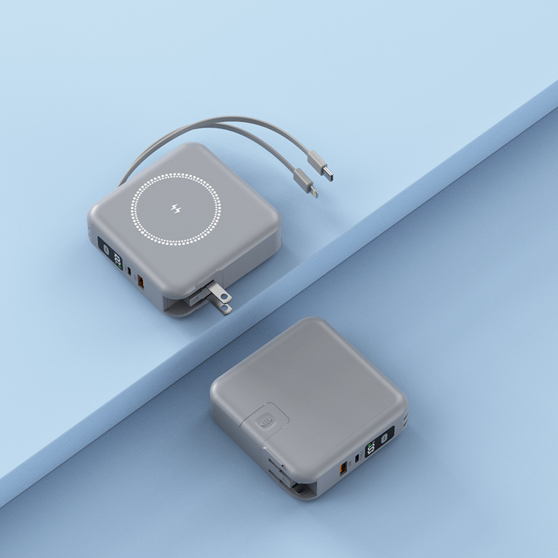 Power Bank 5 en 1 con enchufe, carga rápida PD20W, carga inalámbrica, cable retráctil y succión magnética
