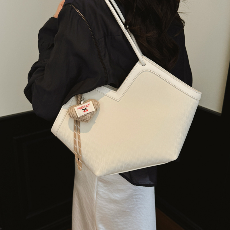 Nicho transfronterizo bolsas de diseño casual para mujeres 2026 nueva moda diaria de verano de gran capacidad de viaje a la axila bolsa de mano