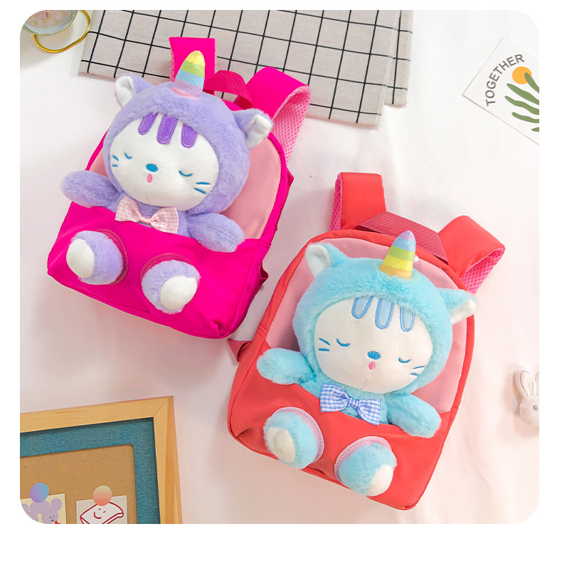The 2022 new children's schoolbag is cartoonish and cute, transforming into a plush cat backpack for girls and kindergartens undefined