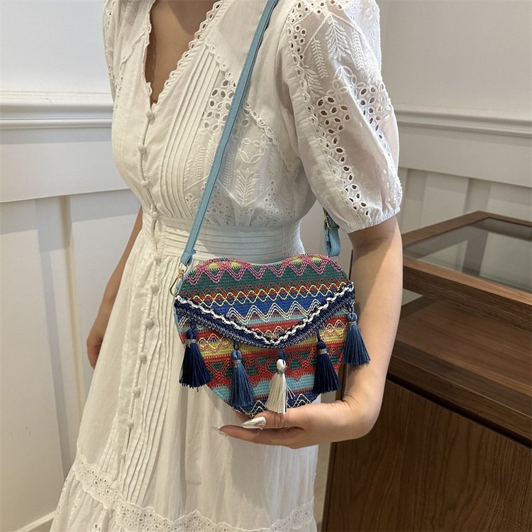 Mayorista bolsos de estilo nacional de mujer 2024 moda nueva mochila en forma de corazón bolsos de hombro bohemios transfronterizos