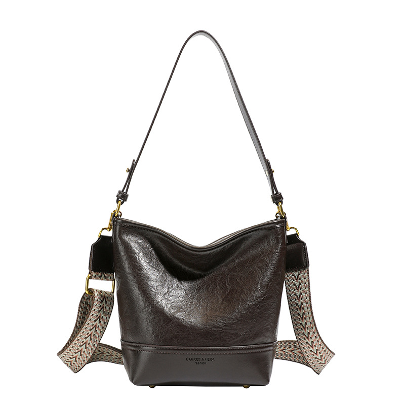 Cross-border 2025 invierno nuevo retro bolso de balde de mujer simple de gran capacidad bolso de hombro para viajar mochila