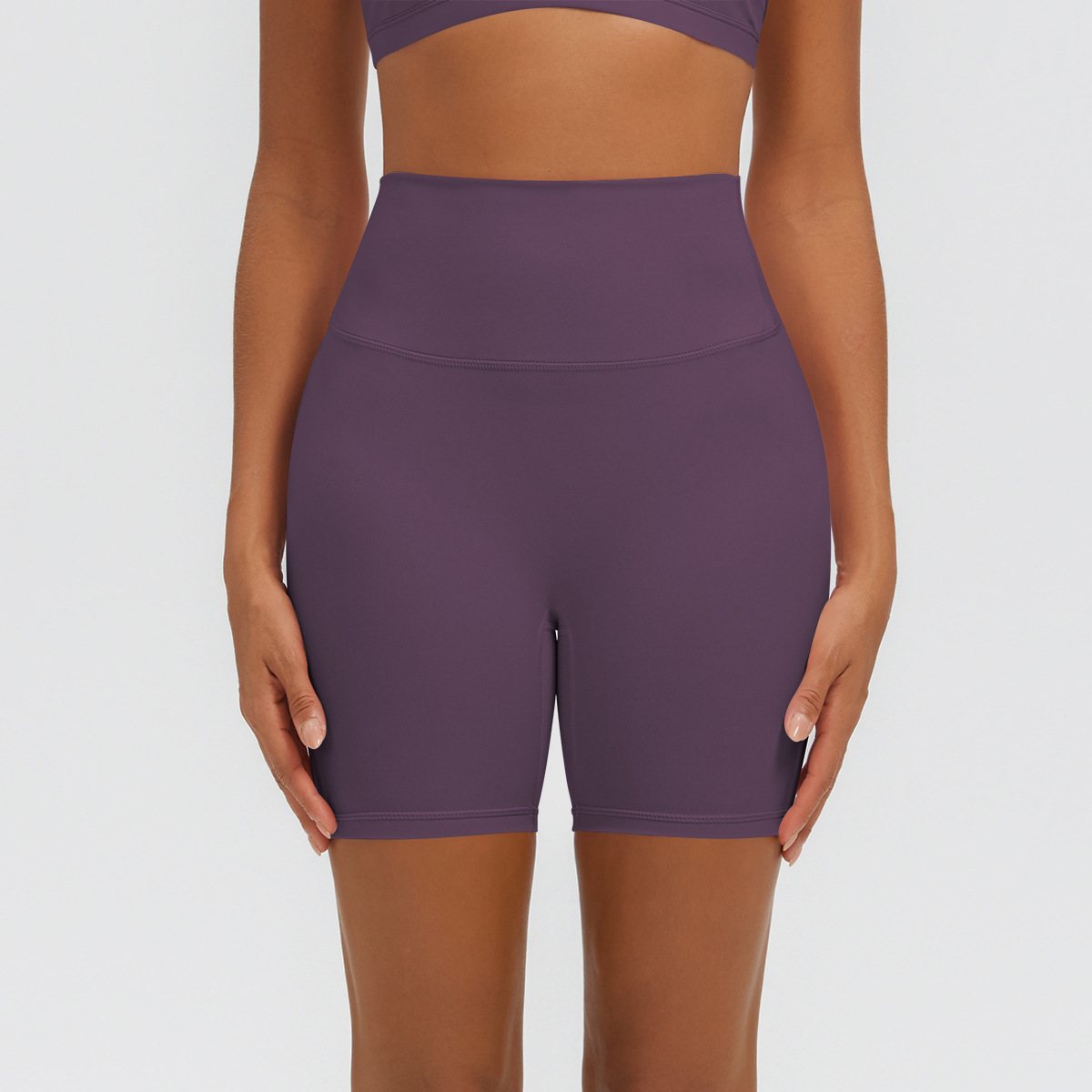 Nuevo tipo delgado de hielo, piel transpirable, ajustado, color sólido, ropa de yoga, pantalones cortos de tres puntos.