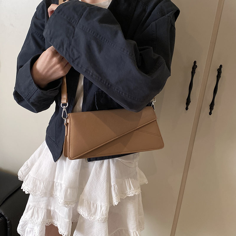 Bolsos pequeños con textura transfronteriza 2025 verano nuevo bolso femenino diseño de nicho bolso de hombro transmisión en vivo del mismo estilo bolso de mensajero marea