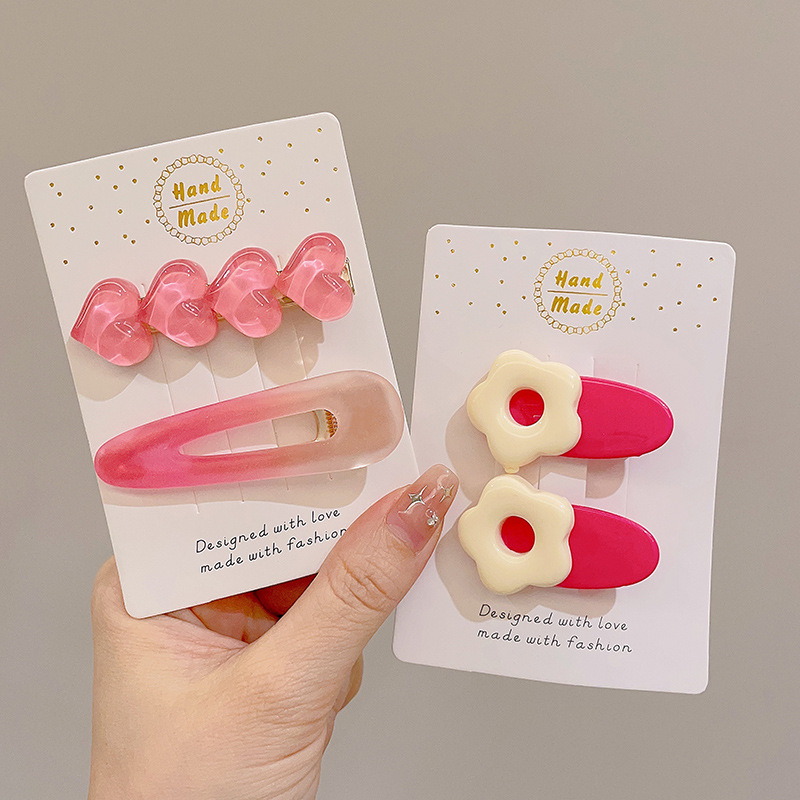 Pin de pelo de verano de dopamina rosa de alto nivel de sensación de frangeo un clip de pelo de frente acabado de pelo de broche adorable adornamiento para el pelo