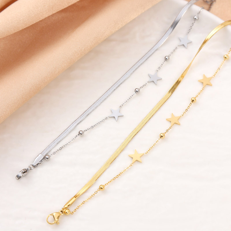Diseño de nicho transfronterizo sensación de cadena de estrellas doble capa de acero de titanio chapado en oro moda universal no desvanecer pulseras al por mayor