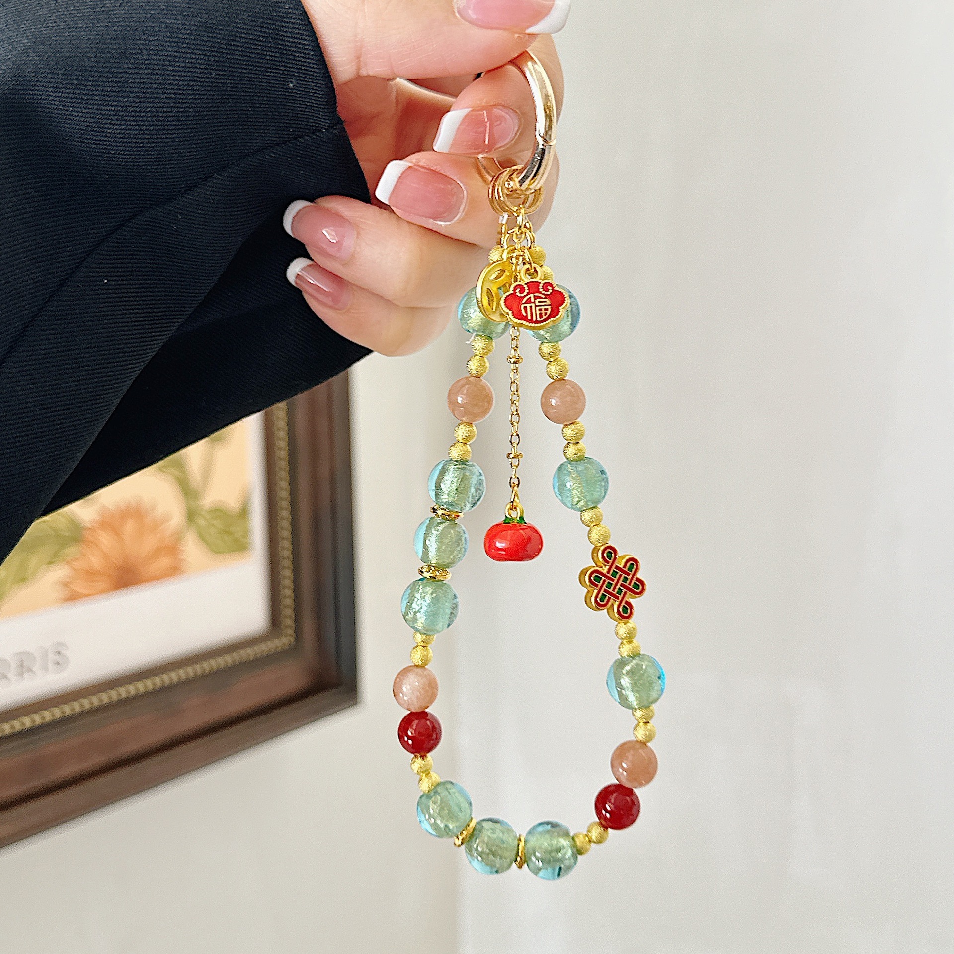 Boutique hecho a mano de alta gama cadena de teléfono móvil pulsera de caqui de vidrio de hoja de oro cordón de teléfono móvil de moda colgante de bolso corto