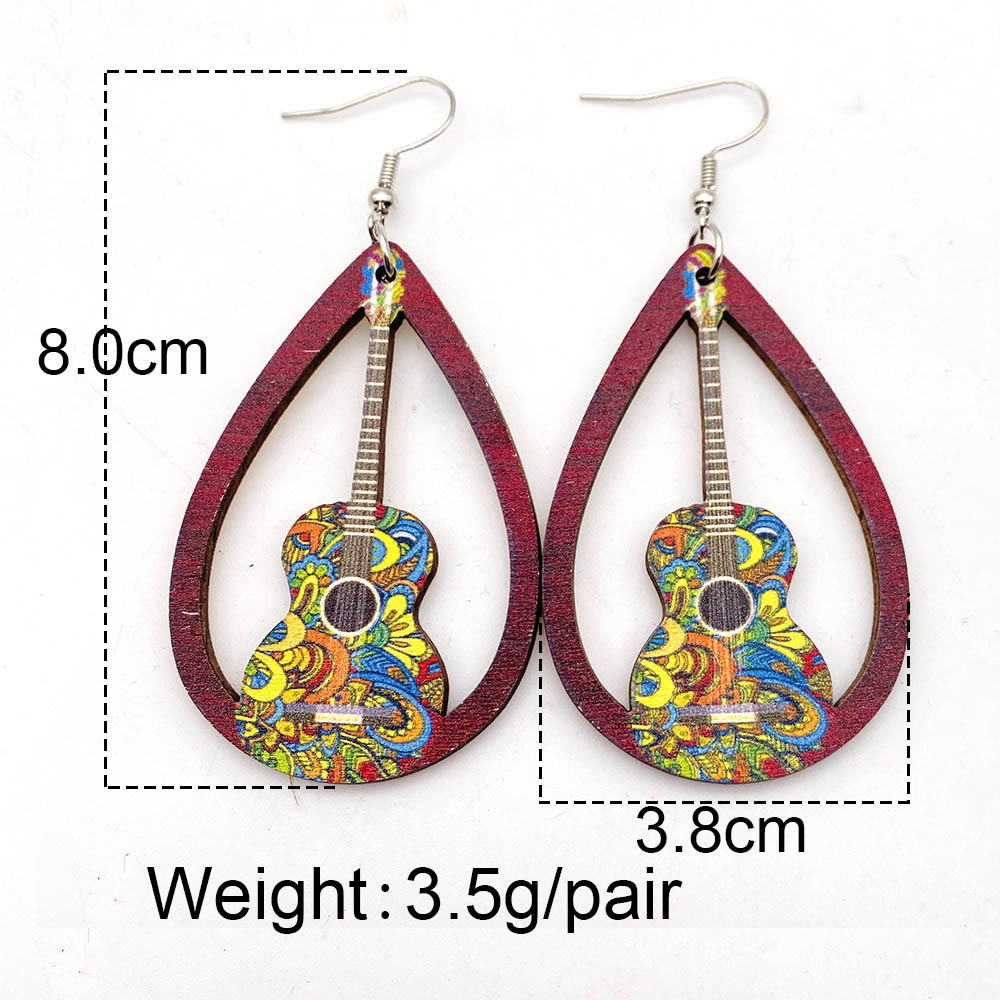 1 Pair Retro Guitar Water Droplets Wood Hollow Out Women's Drop Earrings display picture 2