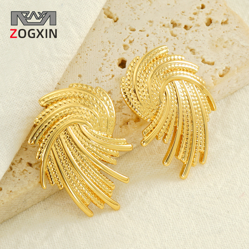 Europa y América transfronteriza personalidad exagerada línea trenzada espiral diseño pendientes en stock al por mayor