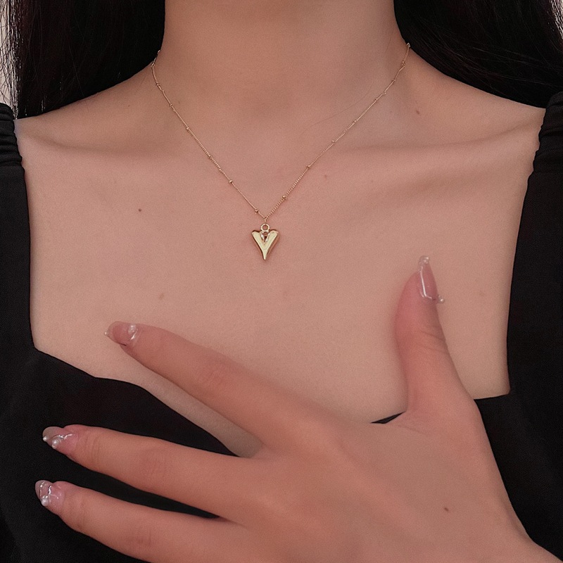 Collier long pendentif cœur géométrique vintage pour femme_voghion.com