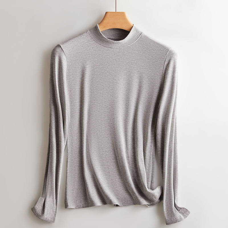 2024 Camisa de fondo de manga larga con hilo de cuello redondo de otoño e invierno simple con un top cálido de mujer delgado de gran tamaño
