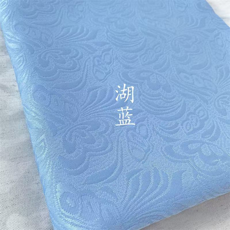 メーカー直販卸売バタフライ恋花レリーフジャカード生地全ポリエステル無弾チャイナドレス漢服服布地復古風