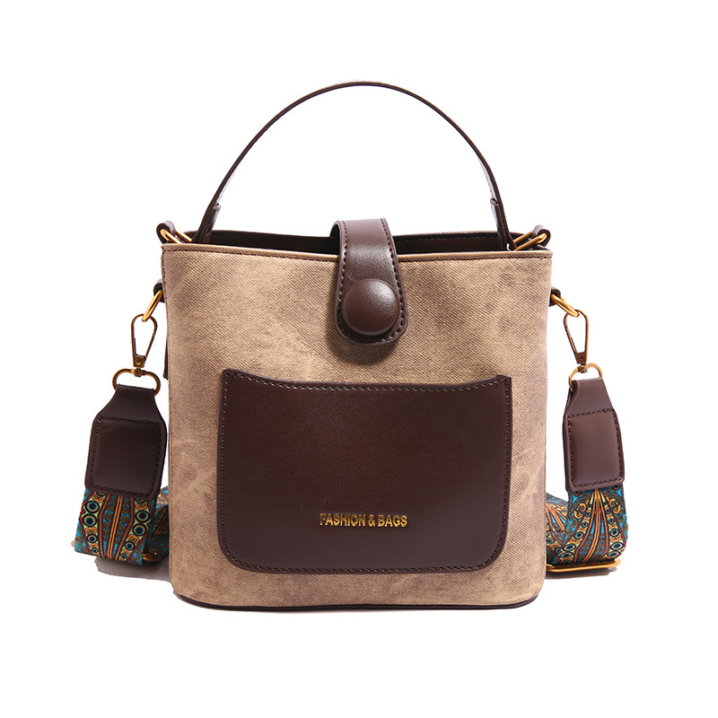 Bolsa de cubo portátil popular de comercio exterior para mujeres 2025 nuevo color de contraste universal bolso de hombro retro moda mochila