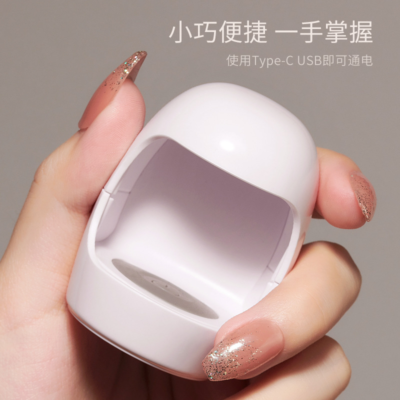 Nuevo mini cáscara de huevo lámpara de uñas máquina de fototerapia UV pequeña portátil de secado rápido esmalte de uñas pegamento lámpara de hornear lámpara secadora