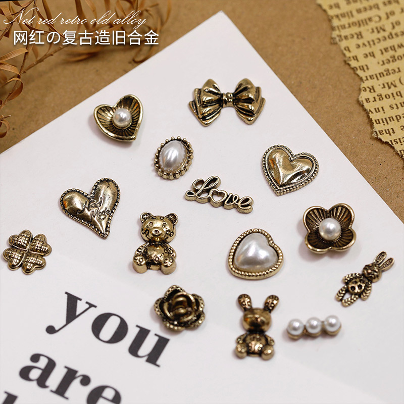 New vintage alloy nail jewelry wholesale bear Pearl bow made old bronze nail decorations