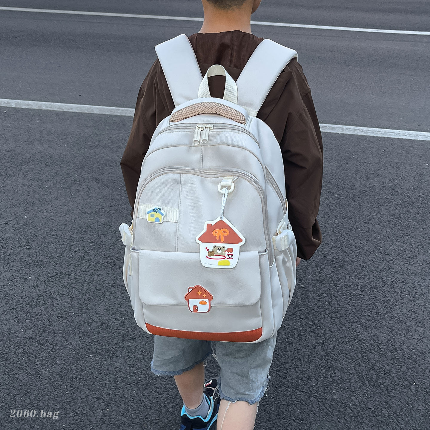 Mochila encantadora mochila japonesa nueva 2026 mochila escolar de gran capacidad estudiante adolescente tarjeta de aprendizaje de viaje a la ventilación