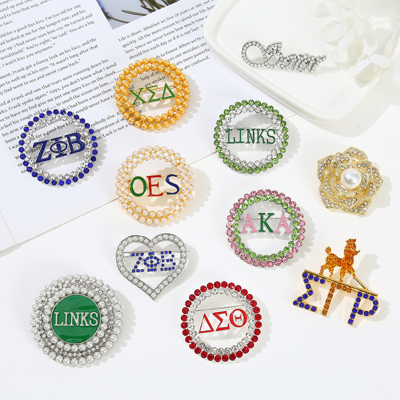 European and American foreign trade popular round hollow alloy OES Greek fraternity letter anti-light brooch pin wholesale European and American foreign trade popular round hollow alloy OES Greek fraternity letter anti-light brooch pin wholesale
