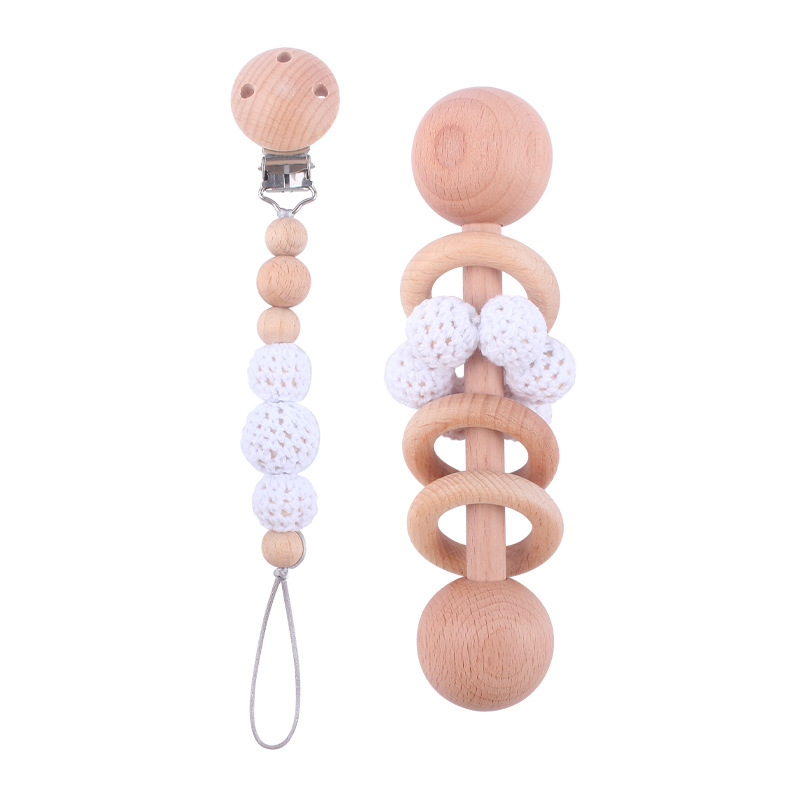 Nuevo bebé suministros Beech Rattle teether juguete calmante bebé bola de lana cuentas de madera pezón cadena traje