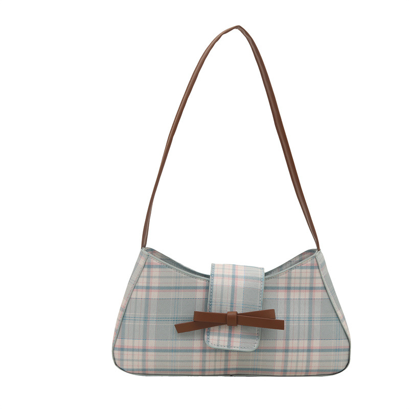 Moda personalidad hermosa versión coreana del bolso de la axila del palo francés 2025 lazo femenino moda nuevo bolso a cuadros de un solo hombro