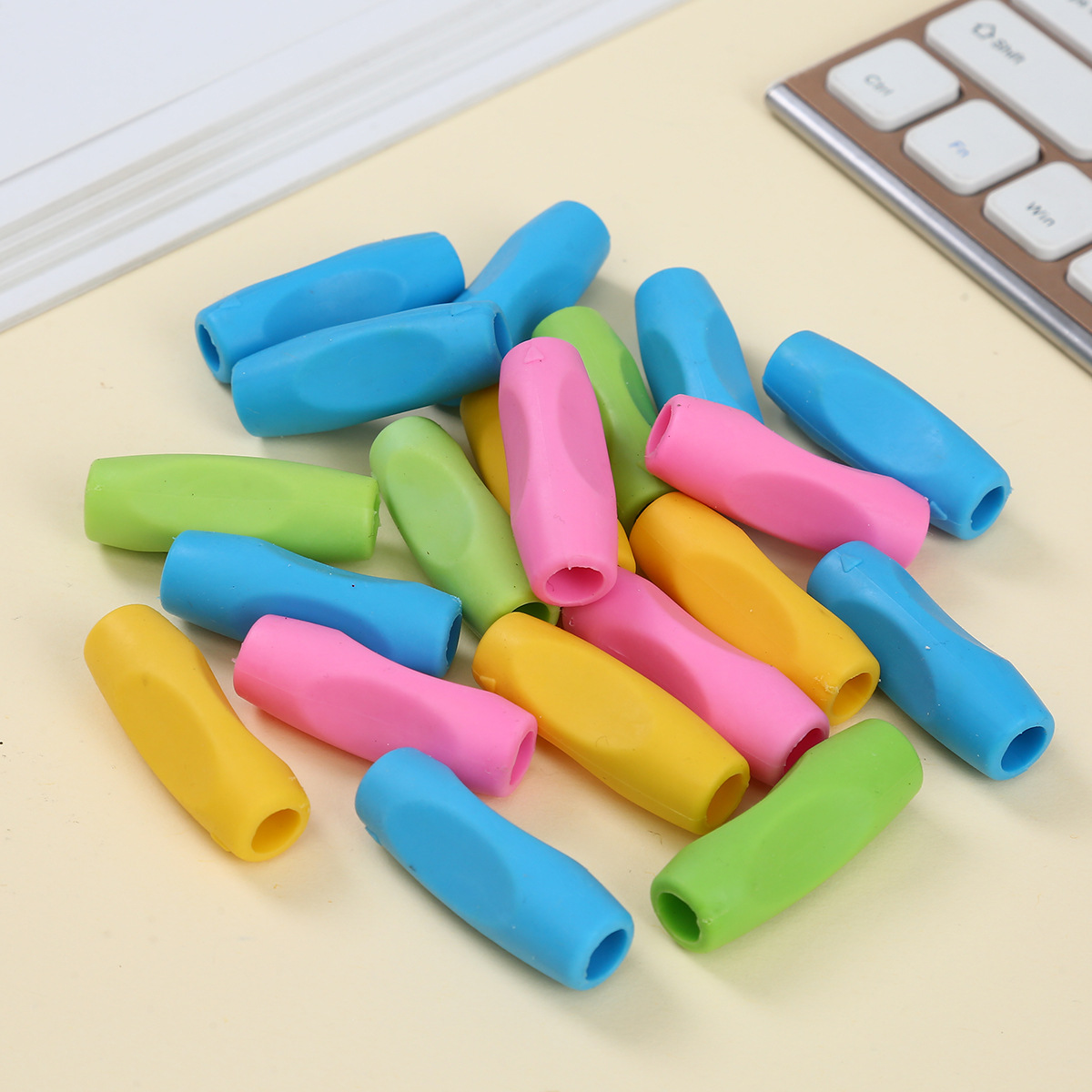 Children's new pen holder corrects writing posture, student and toddler pen holding sheath, candy-colored silicone pen holder