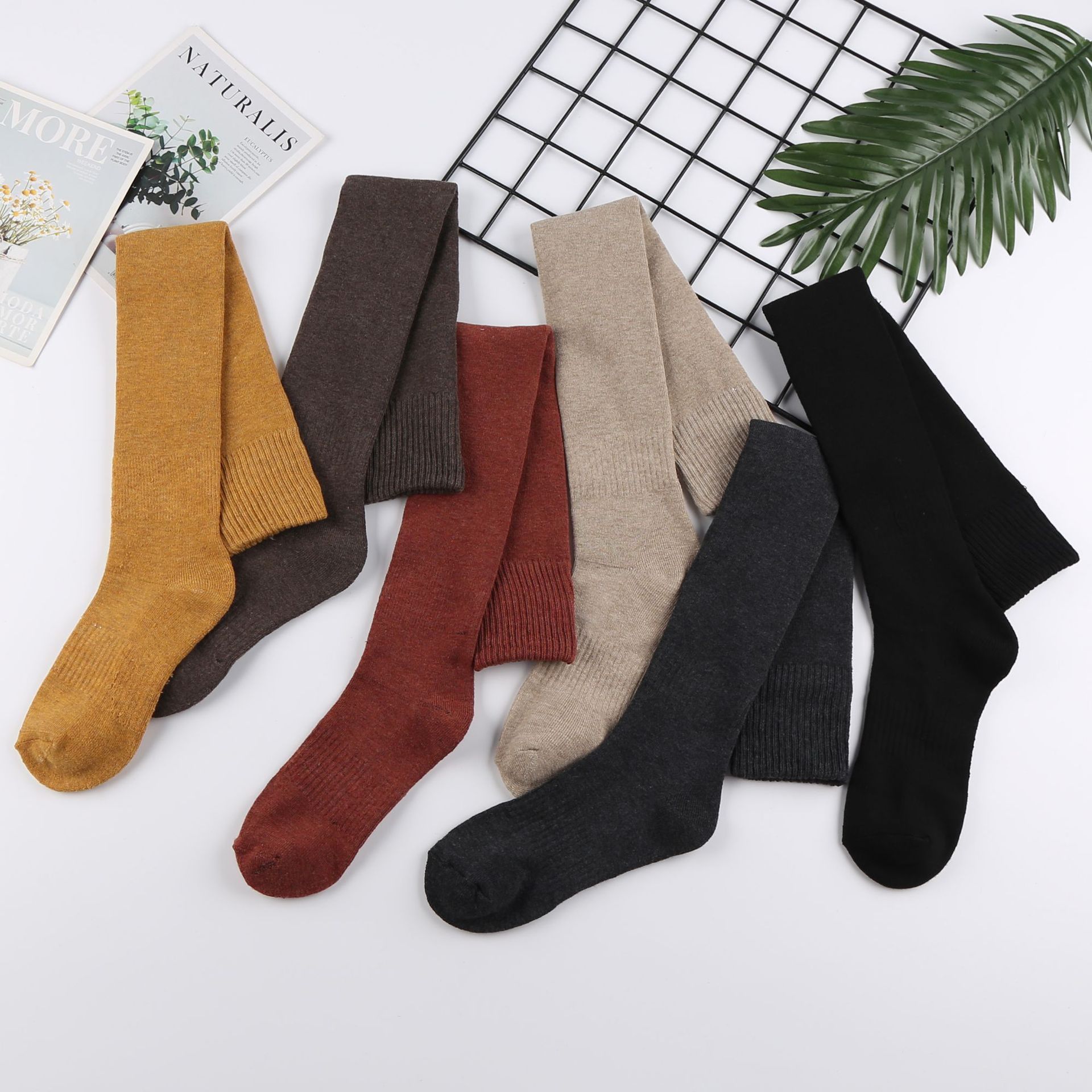 Zhuji calcetines de otoño e invierno al por mayor de las mujeres medias de invierno cálido color sólido forrado de lana gruesa larga Terry sobre la rodilla Calcetines