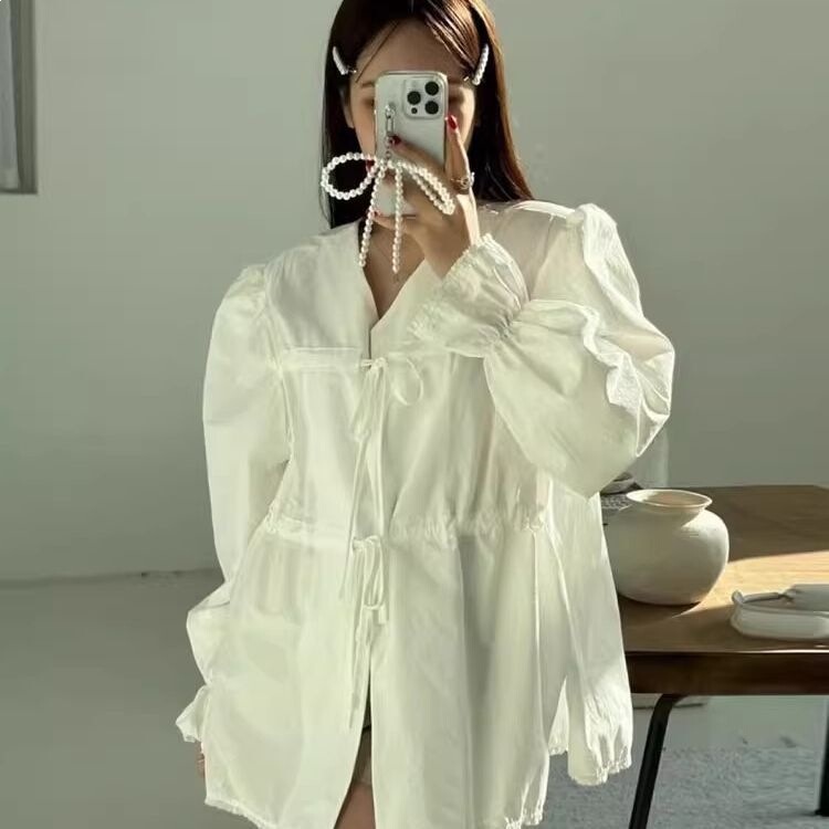 Korean Spring New Niche Design Lace-Up Shirt for Women, Loose Fit, Versatile, with Flared Sleeves Korean Spring New Niche Design Lace-Up Shirt for Women, Loose Fit, Versatile, with Flared Sleeves