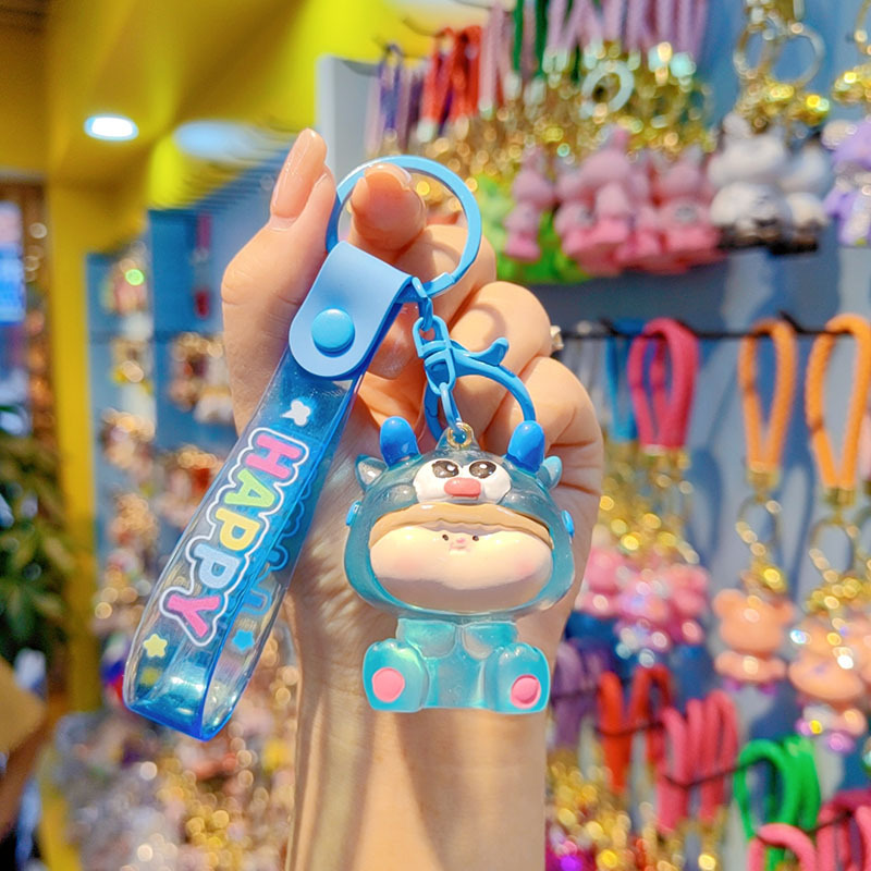 Caricatura Lilith dragón lindos colgantes de resina transparente bolsos de automóviles colgantes de llaves al por mayor