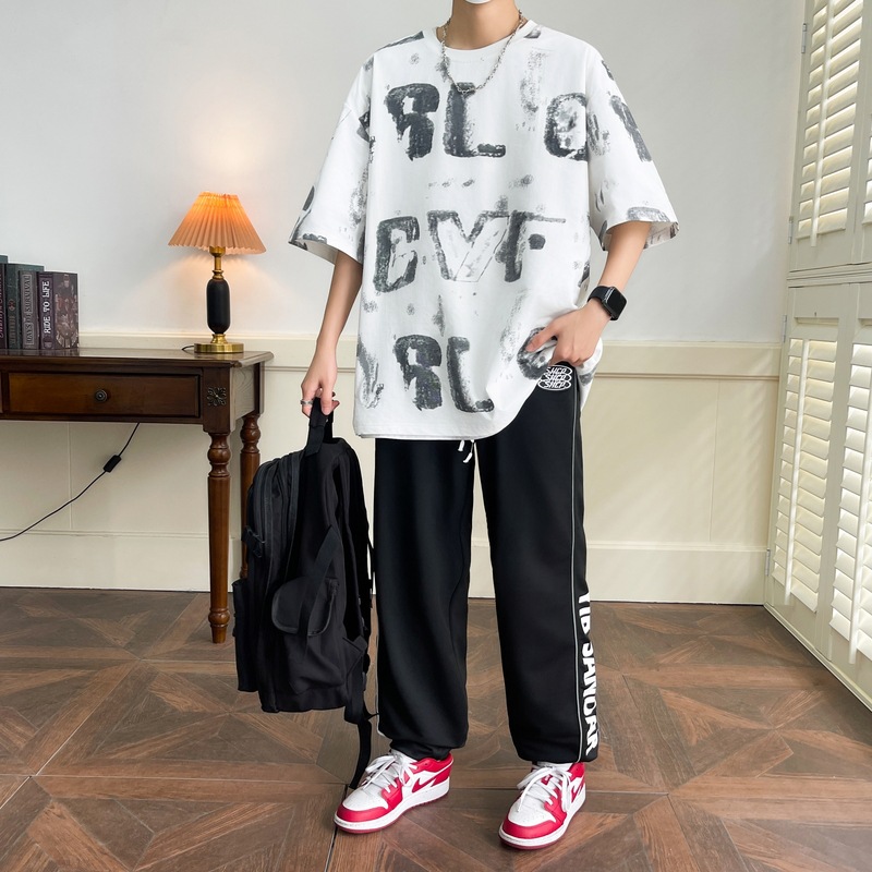 Set de verano de manga corta para hombres de moda de media manga suelta de moda impresa completa camiseta pantalones de dos piezas de moda universal