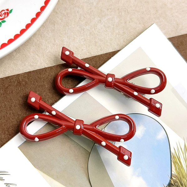 With bow, red