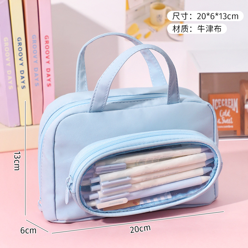Caja de lápiz de gran capacidad de dibujos animados al por mayor bolsa de almacenamiento de caja de lápiz portátil de estudiante bolsa de cosméticos lindo caja de papelería liquidación de pérdida