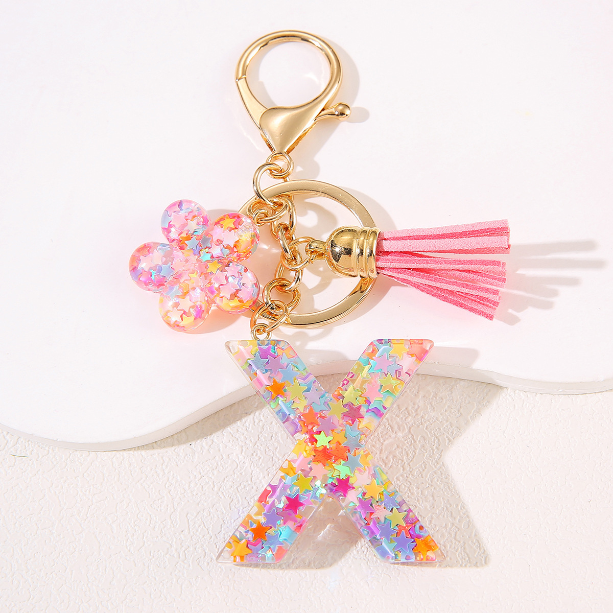 Un nuevo llavero flor de goteo de goma esquinilla 26 letras bolsos colgante llavero accesorios Yiwu