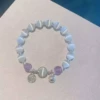 S387 purple bead bell bracelet
