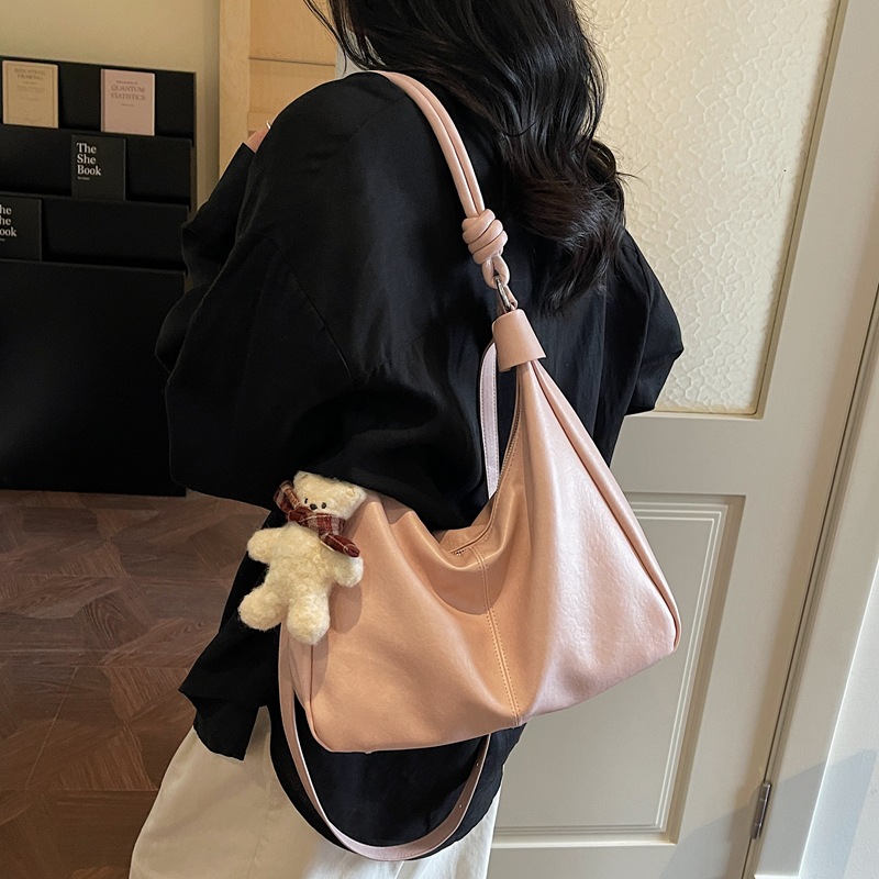 Bolsos de textura para mujeres 2026 nueva moda popular simple sensación cotidiana bolso de hombro de gran capacidad bolsa de viaje