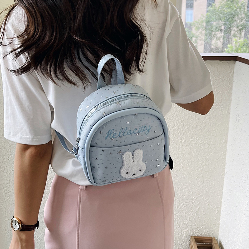 Mochila de viento encantadora de dibujos animados para mujeres 2026 nueva moda, mochila de estudiantes portátil, mini mochila de viaje ligera