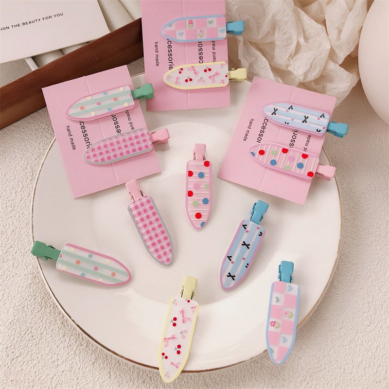 Un par de impresión de arco para niñas pinzas de cabello sin marcas de dibujos animados para mujeres adorables pinzas de cabello para el cabello de bordas rotas