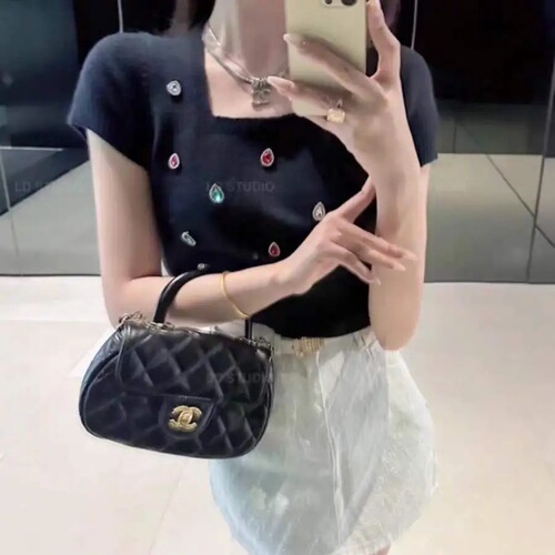 Sleek, sultry, and sweet—this chic, uniquely designed knit short-sleeve T-shirt features a bold square neckline, perfect for summer vibes and effortlessly eye-catching style.