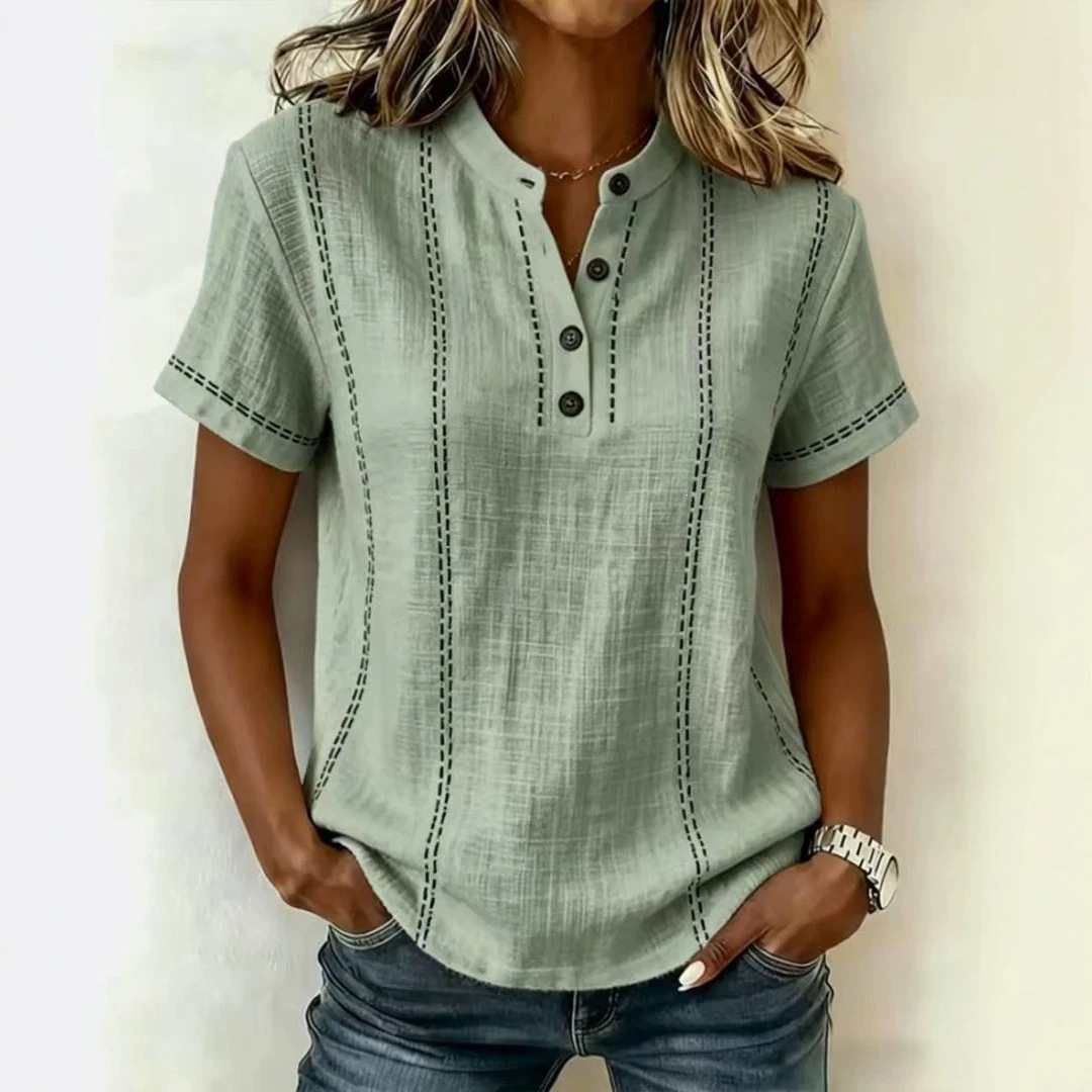 Transfronterizo 2026 estación independiente Amazon verano relajado casual explosión impresa botón de cuello de pie camisa de mujer de manga corta