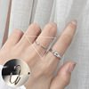 Retro fashionable ring, silver 925 sample, on index finger