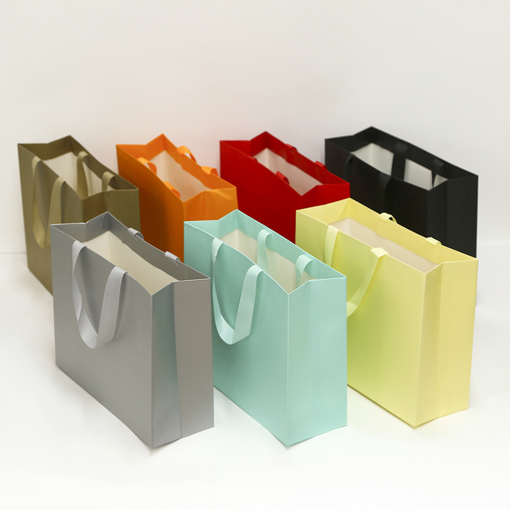 Bolsa de papel de cartón blanco florista bolsa de mano logotipo fija bolsa de regalo bolsa de regalo de Navidad bolsa de mano sin cintura