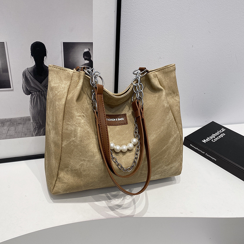 Capacidad de gran cadena de TOT 2024 nueva bolsa de moda de viaje de hombro de invierno para estudiantes universitarios superiores bolsa de clase