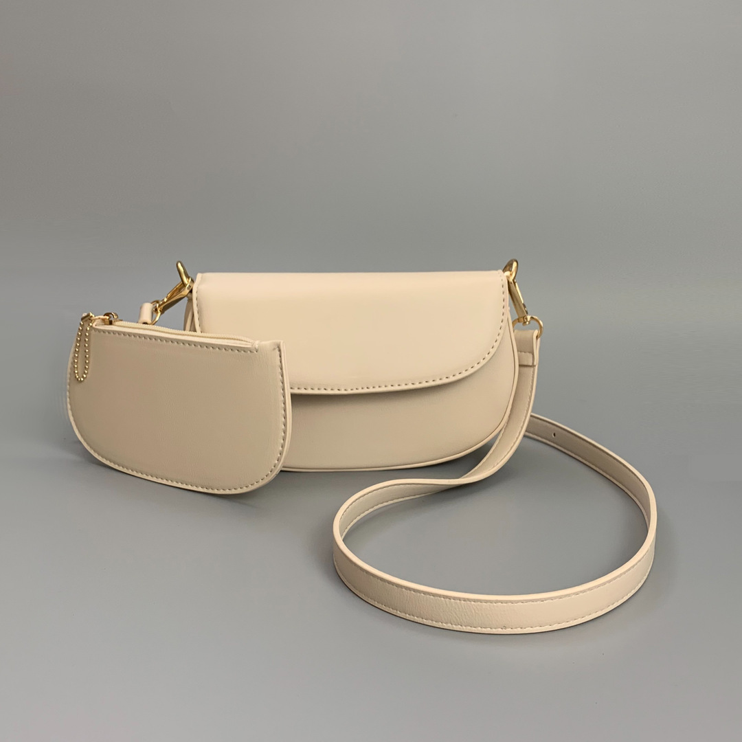 2025 moda bolsos de silla de montar de tendencia sólida Baise casual bolsos de hombro para enviar bolsos de tarjetas pequeñas del mismo color personalidad estética