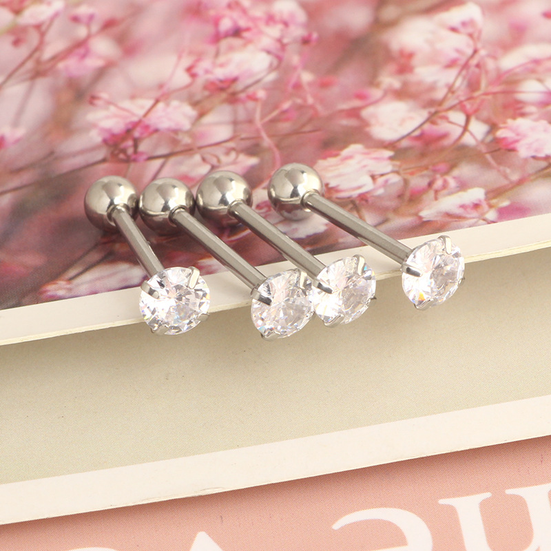 Silver pointed spike labret stud material detail